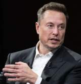 Imagine Articol Cu un „măr” îl ții pe Musk la distanță: Avertismentul șefului Tesla...
