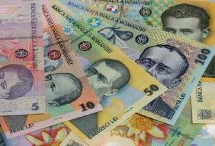 Moneda nationala s-a depreciat, intr-o piata cu lichiditate in crestere