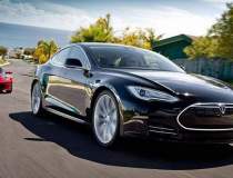 Tesla Model S depășește...