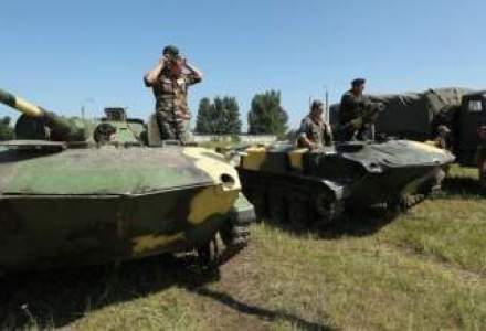 AFP: Soldatii ucraineni si fortele ruse, protagonisti intr-un "razboi ciudat" in Crimeea