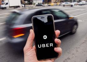 Imagine: Schimbări pentru clienții Uber. Cât costă acum anularea unei curse în București